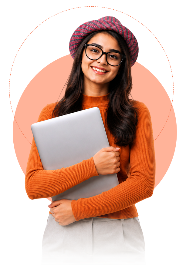 Smiling student holding a laptop
